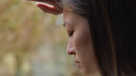 Close-Up-Of-Stressed-Or-Anxious-Woman-Suffering-With-Depression-Anxiety-Loneliness-Or-Agoraphobia-Leaning-Against-Window-At-Home-4